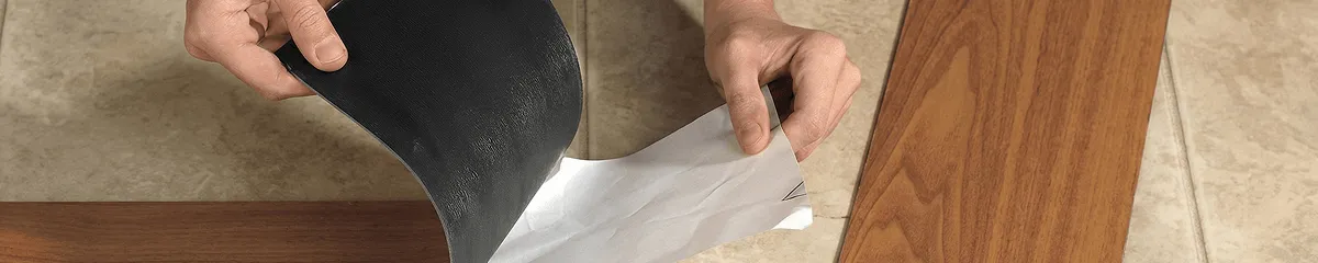 A professional installing vinyl flooring in Pueblo, CO